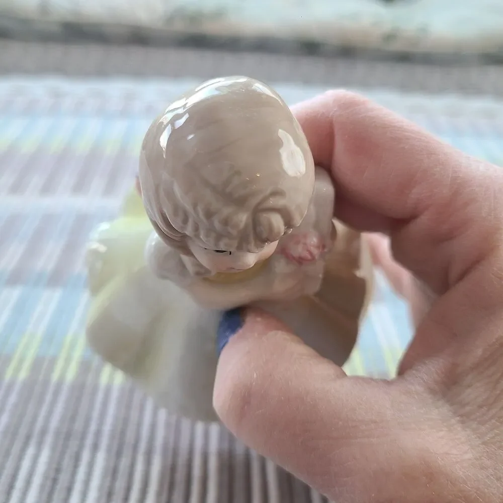 RARE Music Box Figurine With Lovely Young Girl Holding A Gift Plays Look Of Love